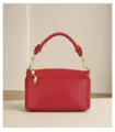 Red leather top-handle crossbody bag detail, gold hardware and double zipper close-up view. - 23*11*13.5 / Burgundy