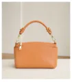 Detailed shot showing the fine texture and hardware details of the leather shoulder bag. - 23*11*13.5 / Earthy Yellow