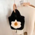 Black plush handbag with wooden ring handle and white flower patch, stylish crossbody bag. - Solid Black