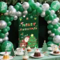 Christmas balloon arch kit with green backdrop, 12-inch latex balloons for holiday party decor. - Green Silver Christmas Backdrop Set 2622