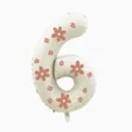Close-up detail of number 6 floral foil balloon, perfect for birthday party decoration layout. - 32 Inch Milky White Floral Number 6