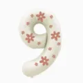Close-up of cream number 9 balloon with pink floral pattern, ideal for birthday party decor. - 32 Inch Milky White Floral Number 9