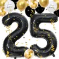 Closeup view of black number 25 foil balloon with gold confetti and happy birthday balloons. - Number 25 Set