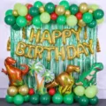 Dinosaur jungle theme birthday party balloon set with foil letters and cute dinosaur designs. - Dinosaur Luxury Balloon Chain Set 2
