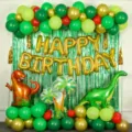 Jungle dinosaur theme balloon set with foil letter balloons and palm tree decorations. - Dinosaur Luxury Balloon Chain Set 8