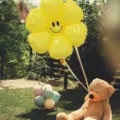 Yellow smiley flower balloon and pastel latex balloons set for kids birthday party decoration. - Large Smiley Daisy (Macaron Yellow)