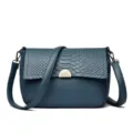 Blue PU leather crossbody bag for women, stylish snake pattern flap shoulder handbag. - Blue