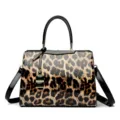 Elegante dames handtas met luipaardprint en zwart lakleer accenten, chique tas. - 28.5x12x22cm / Luipaardprint