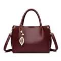 Burgundy leather women handbag with pearl leaf pendant, stylish shoulder tote bag for daily use. - 29*13*22 / Burgundy
