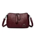 Maroon embossed floral women shoulder bag, stylish crossbody bag with adjustable strap. - Red
