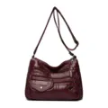 Burgundy PU leather women crossbody shoulder bag featuring multiple pockets and adjustable strap. - Red
