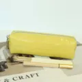 Yellow crocodile pattern leather makeup pouch detail shot, compact storage bag with zipper. - 20x6x5cm / Egg Yolk Yellow