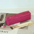 Pink crocodile pattern leather cosmetic pouch detail view, perfect for makeup and keys. - 20x6x5cm / Misty Rose Red