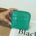 Green crocodile pattern genuine leather coin purse and card holder with zipper closure. - Emerald