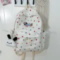 Zaino bianco in tela con pois colorati e un simpatico ciondolo cucciolo di cartone animato. - con portachiavi / Cane con Cappello Blu Maculato