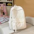 Zaino bianco trapuntato con motivo a stelle, grande capacità per scuola e uso quotidiano. - Bianco