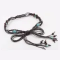 Detailed view of the bohemian braided waist belt featuring turquoise resin beads and metal accents. - Coffee