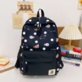Zaino casual stile giapponese a pois con stampa di cartoni animati grande capacità. - Nero
