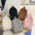 Corduroy backpack with cute bow print, large capacity school bag for students casual daily use. - One Size / Brown