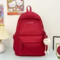 Zaino minimalista rosso, grande borsa scolastica per studenti con grazioso ciondolo in peluche morbido - Rosso