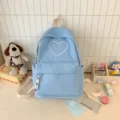 Cute light blue backpack with white heart embroidery, stylish student school bookbag. - 30x13x40cm / Blue