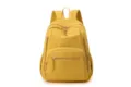 Yellow casual nylon backpack with multiple zippered pockets, spacious and lightweight for daily commute. - Yellow