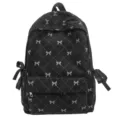 Zaino in velluto a coste nero con simpatici motivi a fiocco, trapuntato a rombi, borsa casual da donna. - Nero
