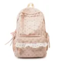 Zaino rosa in velluto a coste con stampa floreale e dolce bordo in pizzo bianco. - Rosa