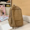 Zaino trapuntato cachi casual da donna con motivi di stelle e ciondoli con nappe alla moda. - Kaki