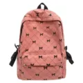Pink corduroy backpack for women, stylish large capacity school bag with black bows. - Pink