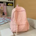 Sac à dos matelassé étoiles roses pour femme, grand sac d'école décontracté et joli sac quotidien. - Rose