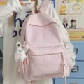 Cute pink polka dot backpack for women and students, casual daily school bag with large capacity. - Pink