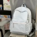 Joli sac à dos bleu clair pour étudiant avec élégante dentelle et grand espace de rangement. - Bleu