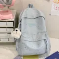 Zaino azzurro con stampa di stelle e ciondolo in peluche, grande capacità per la scuola. - con portachiavi / Taglia L / Blu