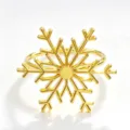 Golden metal snowflake napkin ring detail shot, elegant table decor for Christmas party. - Gold