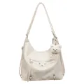 Off-white multi-way leather backpack shoulder bag featuring a cute bear pendant and metal studs. - Off White