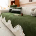 Dark green quilted sofa cover with elegant white lace frills and matching throw pillows for living room. - 70*70cm / Green