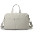 Light grey travel gym bag for women, short trip luggage bag with convenient zippers. - Vanilla Cream
