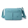 Light blue multi-layer casual nylon crossbody shoulder bag with multiple zippered pockets. - Miami Blue
