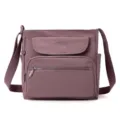 Stylish purple fabric crossbody shoulder bag with multi-pockets front view display - Tree Pink