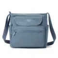 Blue nylon crossbody shoulder bag for women, multi-pocket casual daily messenger handbag main view - Glacier Blue