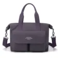 Sac cabas léger en nylon violet avec poignées, bandoulière et poche avant spacieuse. - Raisin Boule de Taro