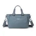 Blue nylon casual shoulder bag for women, multi-pocket crossbody bag with top handles. - Glacier Blue
