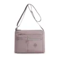 Stylish women's nylon crossbody shoulder bag with multi pockets, ideal for daily casual travel. - Purple