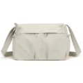 Water-resistant nylon crossbody bag for women, casual daily shoulder handbag with multi pockets. - Cream