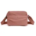Minimalist waterproof nylon crossbody shoulder bag for women, casual daily wear style. - Candy Pink