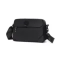 Detailed view of black nylon crossbody bag, casual shoulder bag with metal zipper and strap. - L / Black