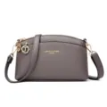 Gray leather dome crossbody bag with adjustable strap, compact shoulder bag for women. - Gray