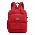 Mochila de nylon roja para mujer con asas superiores, múltiples bolsillos y puerto USB. - Burdeos