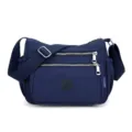 Classic blue nylon crossbody bag with multiple zipper pockets, casual daily shoulder handbag. - Blue